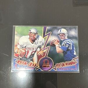 Omega Trading Card with Red and Blue Accents of Leaf and Manning RC MINT
